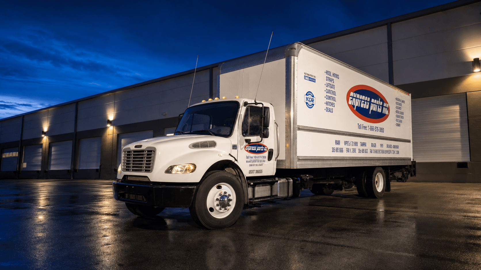 Express Parts Freightliner box truck with a blue and orange partial commercial wrap